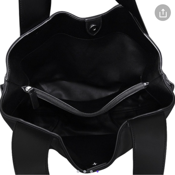 CK drawstring bucket bag. Plastic still on the hardware. And smells great. - Picture 2 of 6